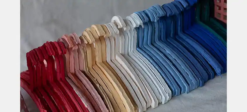 Molded hangers made from textile residues
