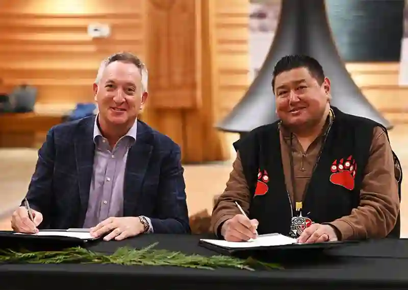 Steven Hofer, president and chief executive officer of Western Forest Products, and John Hackett, Tla’amin Nation hegus.